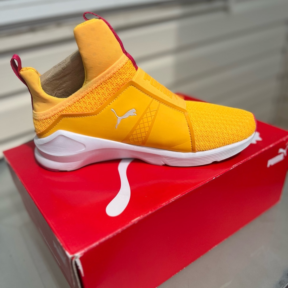 Yellow and white puma sneakers